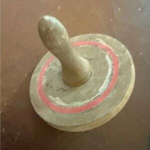 Vintage Wooden Spinning Top with Red Accent